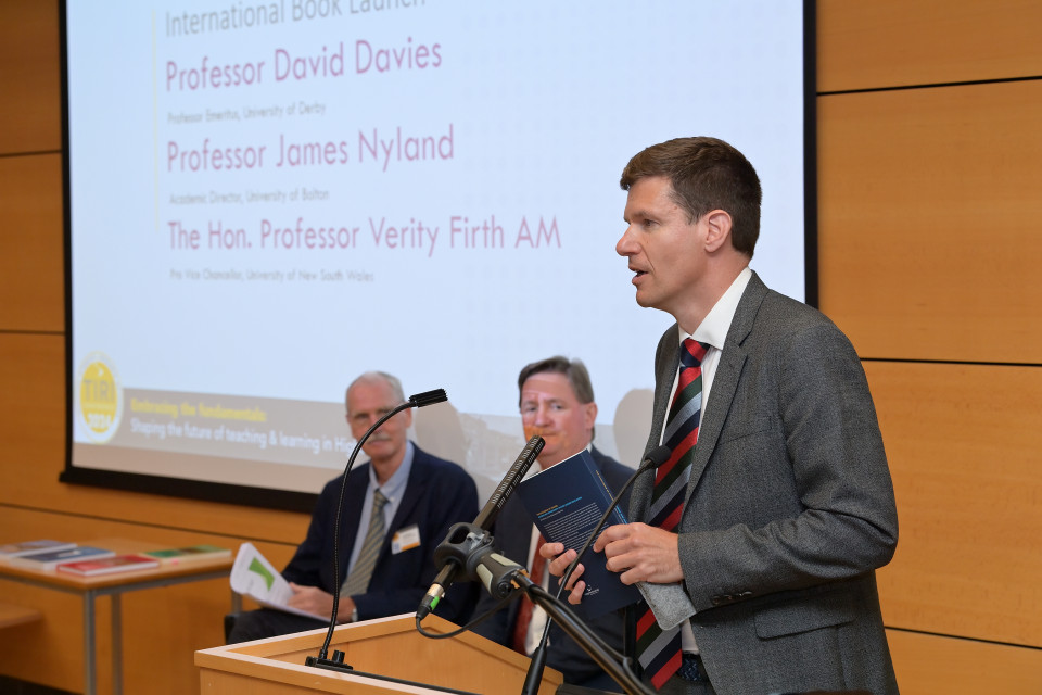 Dr Greg Walker, Pro Vice Chancellor, introduces Professors Davies and Nyland at the book launch event (part of the TIRI Conference) on Wednesday 11 September